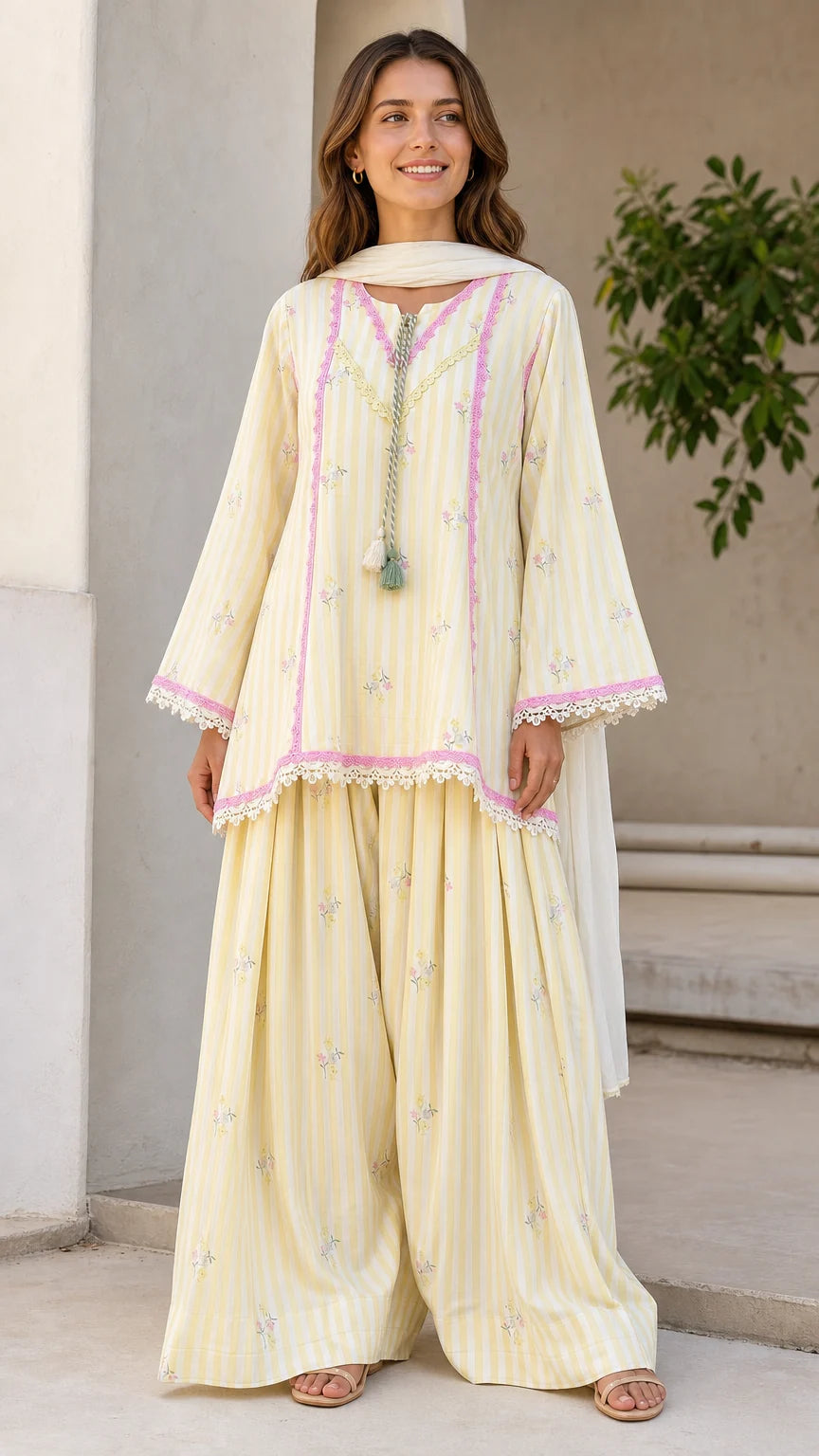 Front view of woman wearing yellow striped ethnic kurti and sharara set