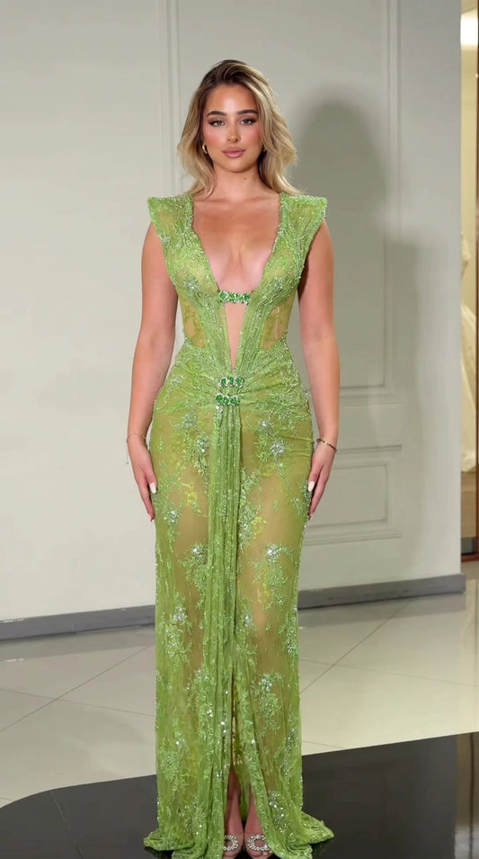 Front view of green embellished sheer maxi evening dress