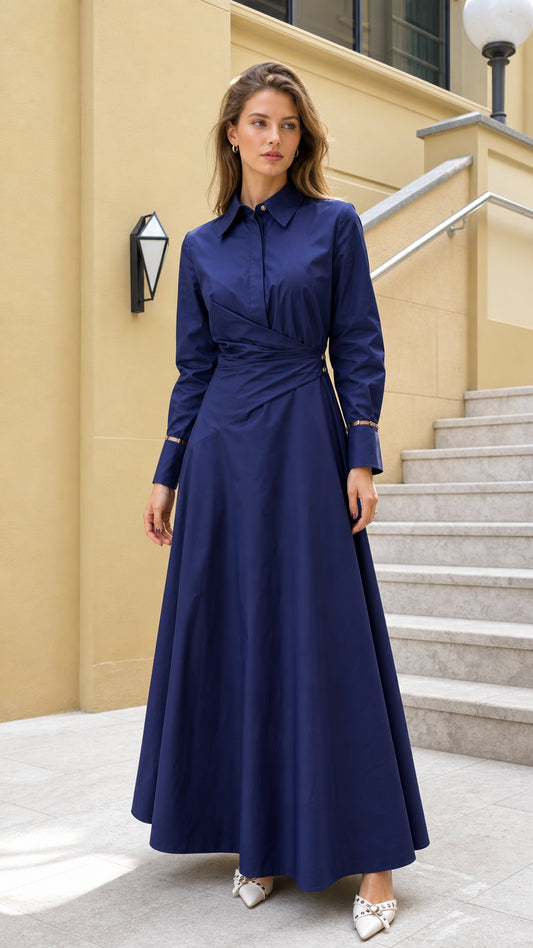Front view of woman wearing navy long-sleeve shirt maxi dress