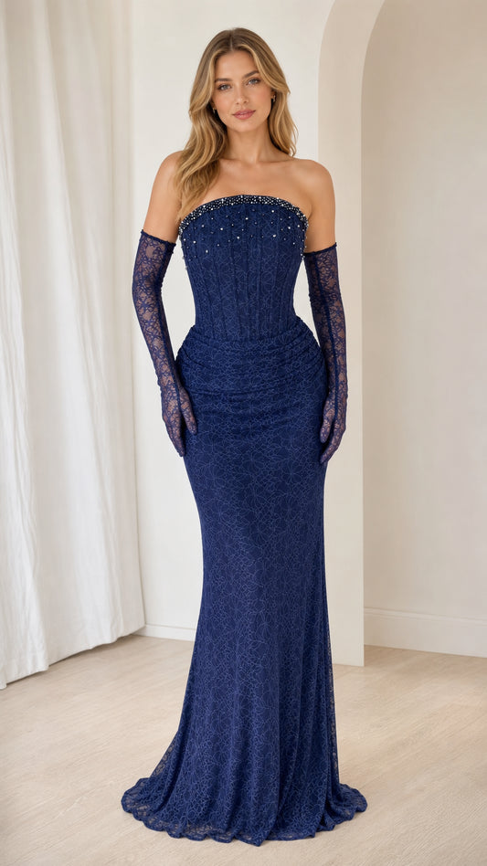 Front view of navy strapless beaded lace evening gown with matching gloves