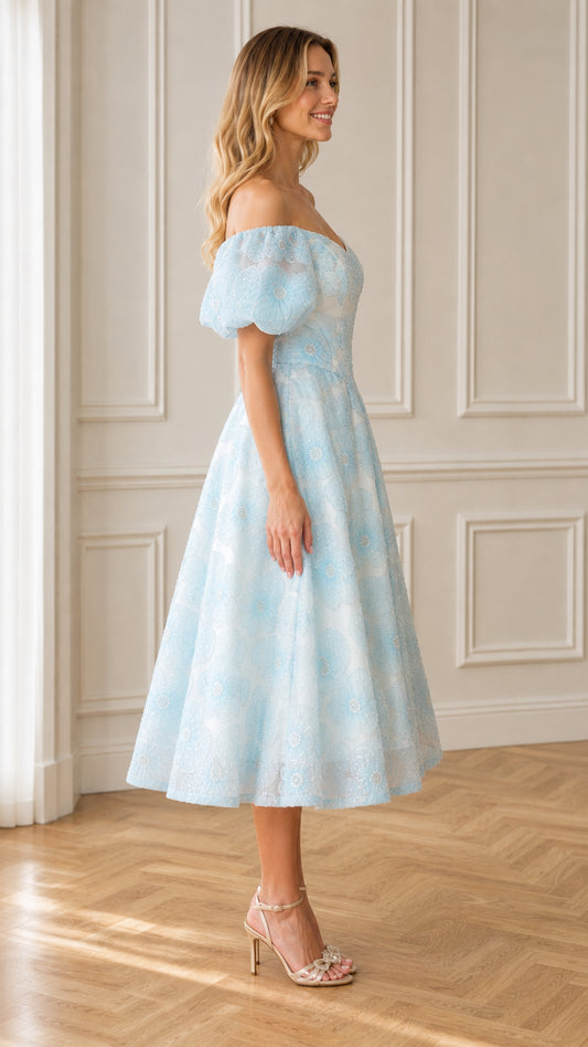 Side view of light blue midi dress with puff sleeves