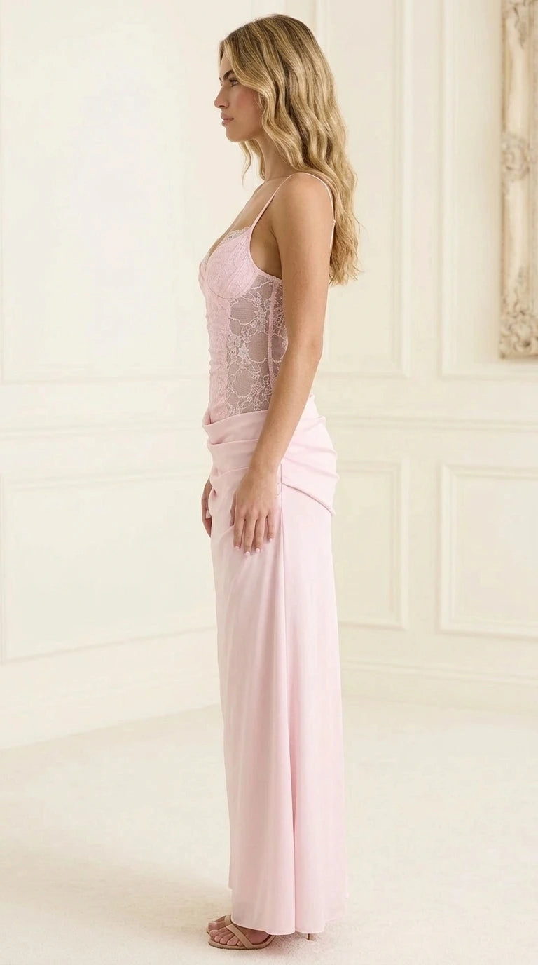 Side profile of model in pink evening gown