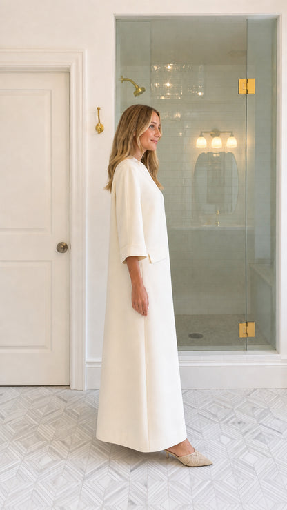 Model wearing Ivory V-Neck Maxi Dress side view