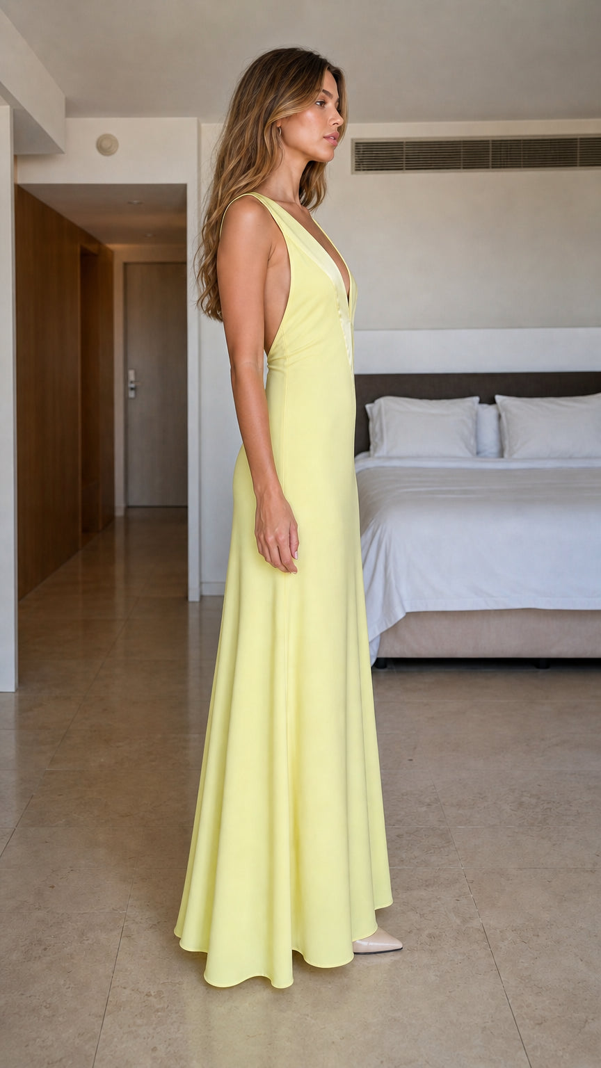 Side profile view of yellow maxi dress