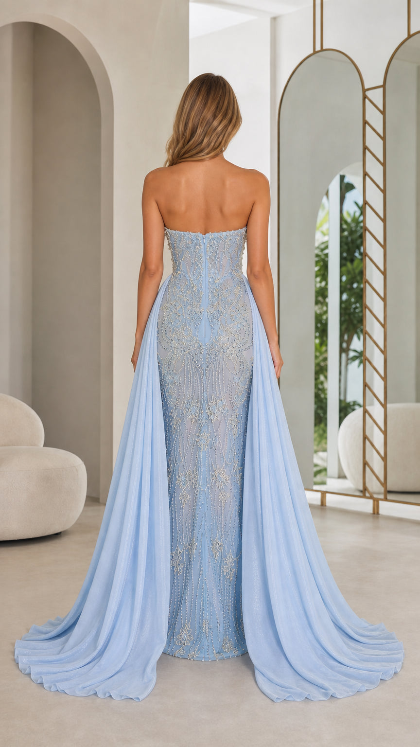 Back view of light blue evening gown with train