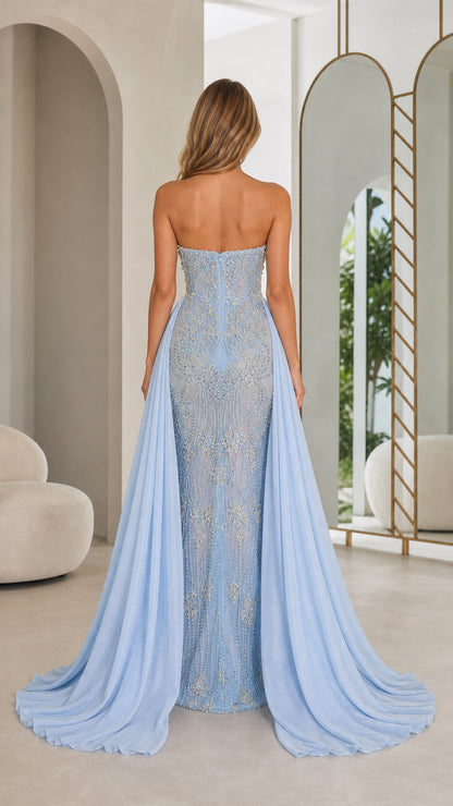 Back view of light blue evening gown with train