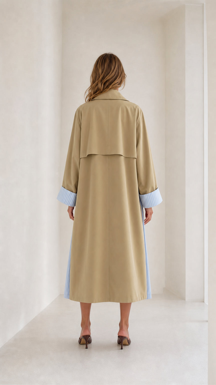 Back view of Khaki trench coat showing striped back vent