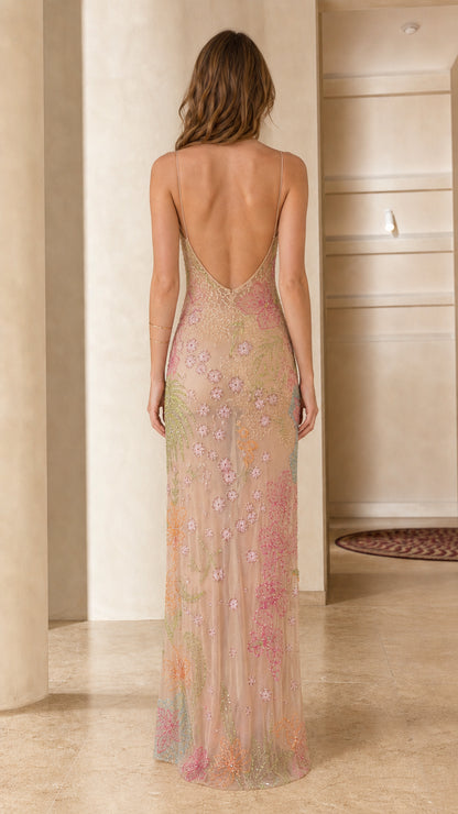 Back view showcasing low V-back design of Nude maxi dress