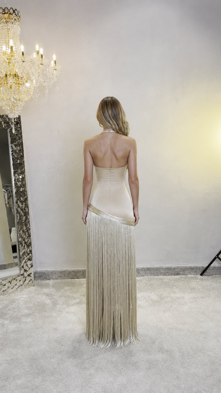 Model wearing Champagne dress back view