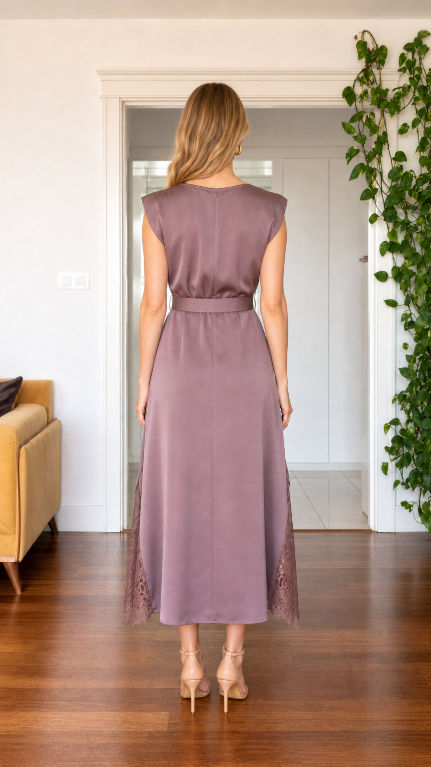 Back view of the mauve midi dress with defined waist and smooth skirt