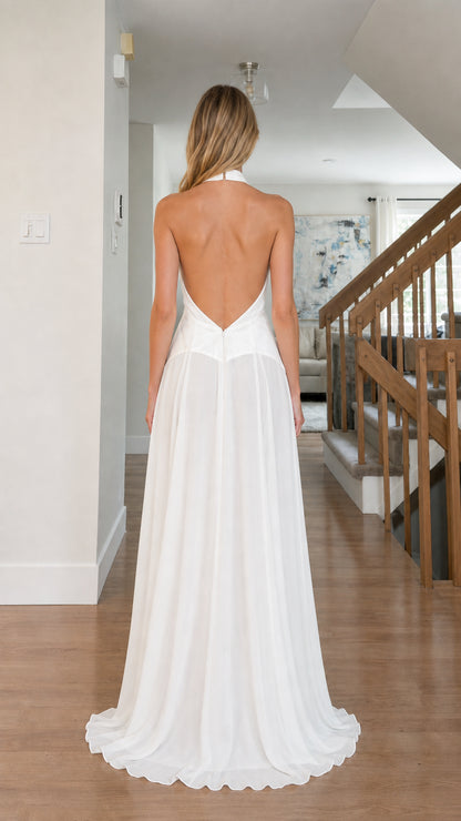 Back view showcasing the open back design of the white gown