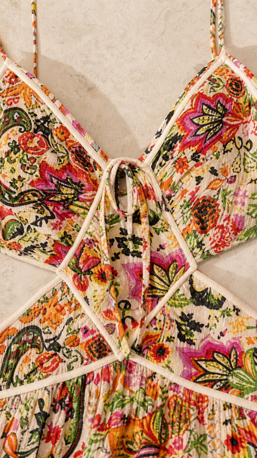 Close-up detail of the bodice, front tie, and cutout construction