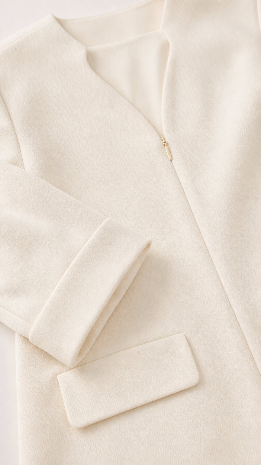 Close-up of Ivory V-Neck Maxi Dress collar and cuff detail