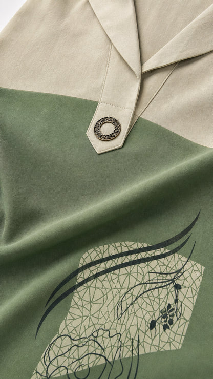 Close up of lapel collar and graphic print detail