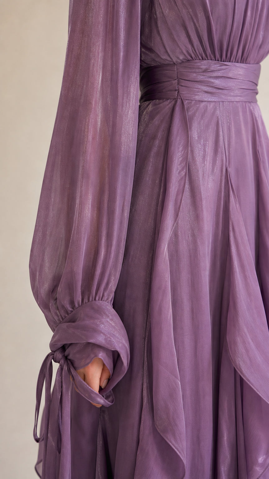 Close-up of sheer sleeve and waist detail on Lavender dress