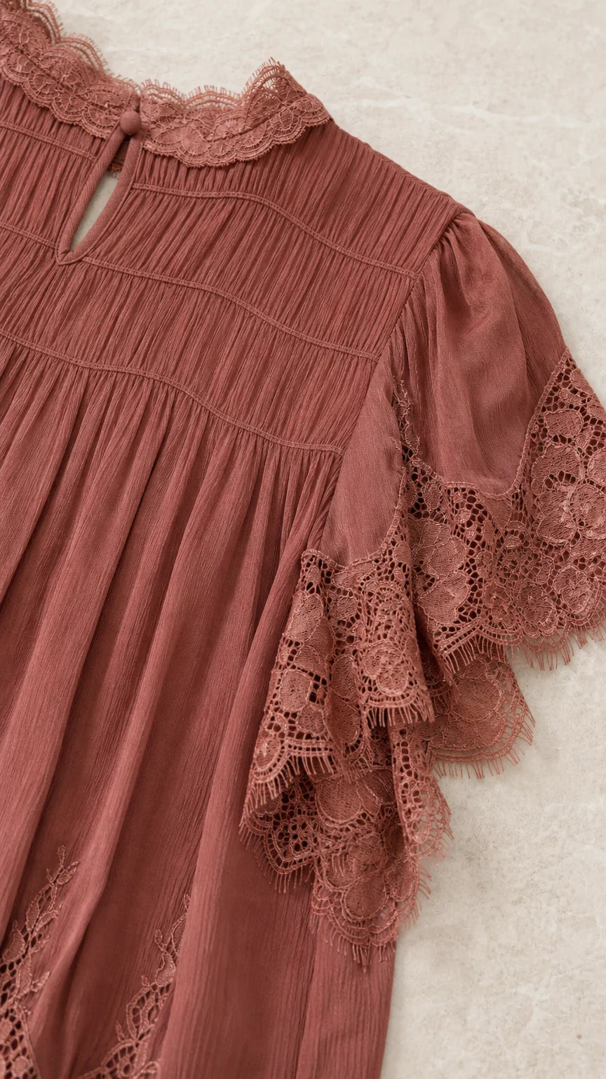 Close up of lace trim detail on Dusty Rose top
