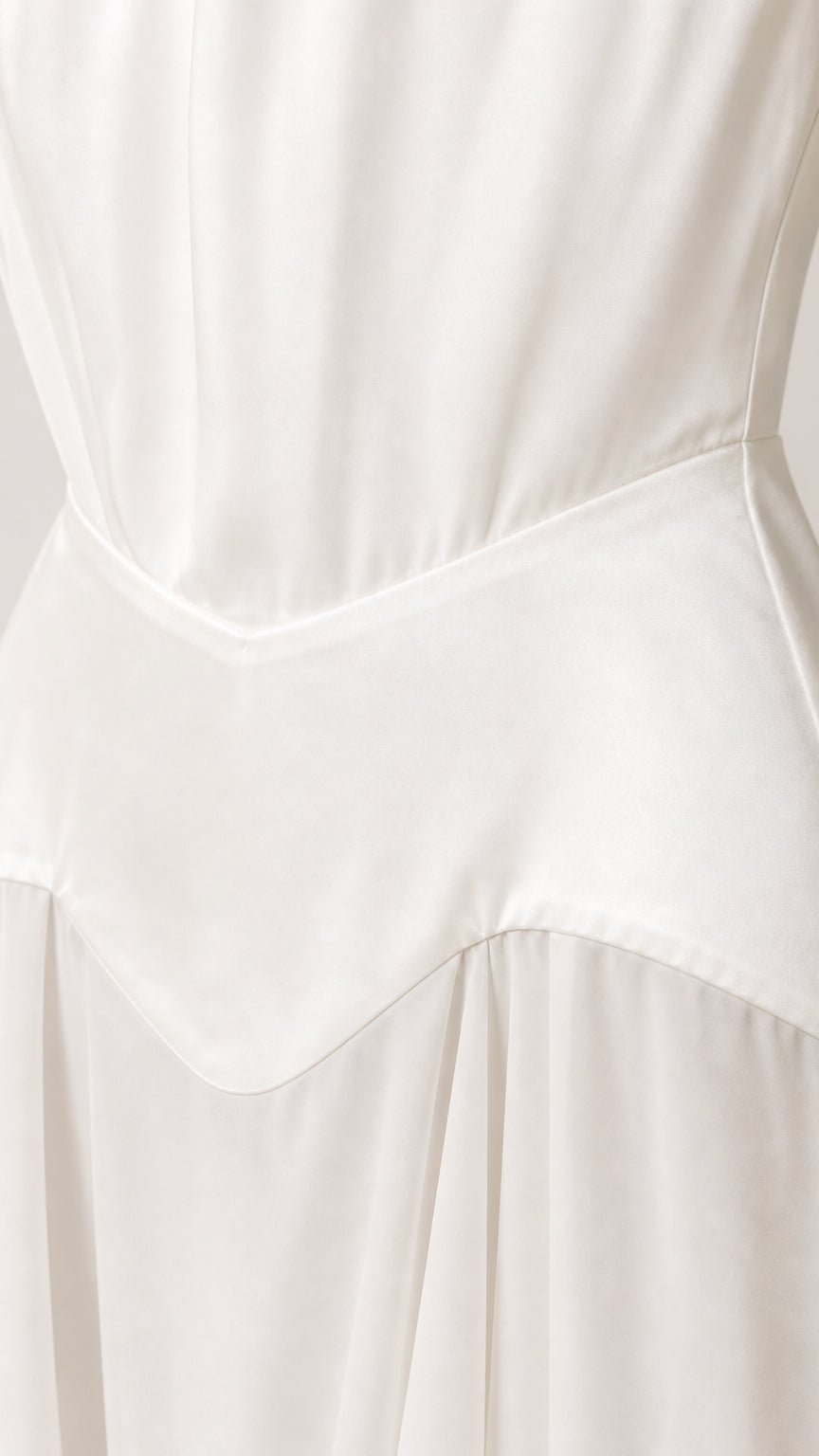 Close-up detail of the structured waist and smooth fabric