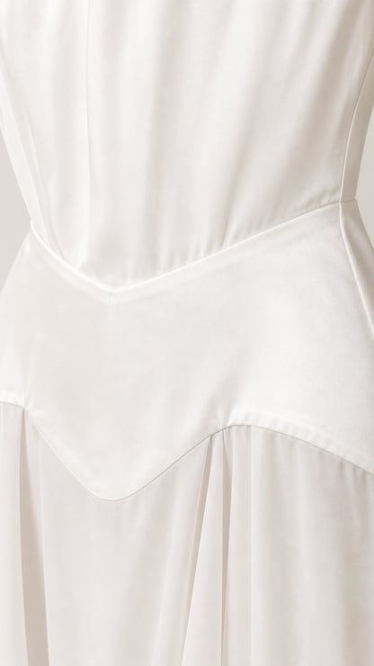 Close-up detail of the structured waist and smooth fabric
