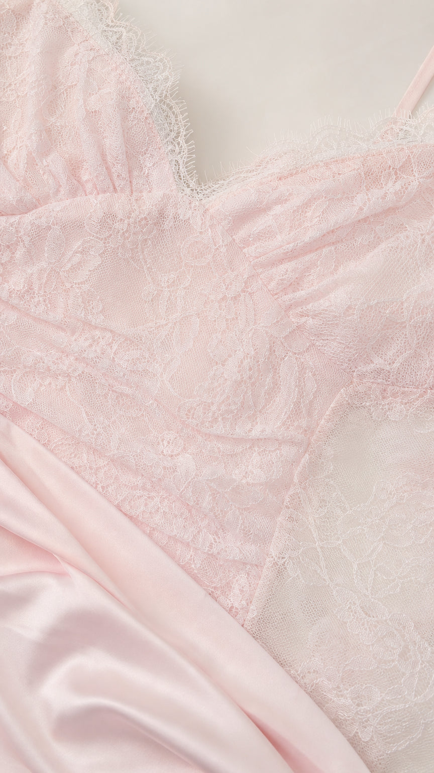 Close-up detail of sheer lace bodice and smooth fabric