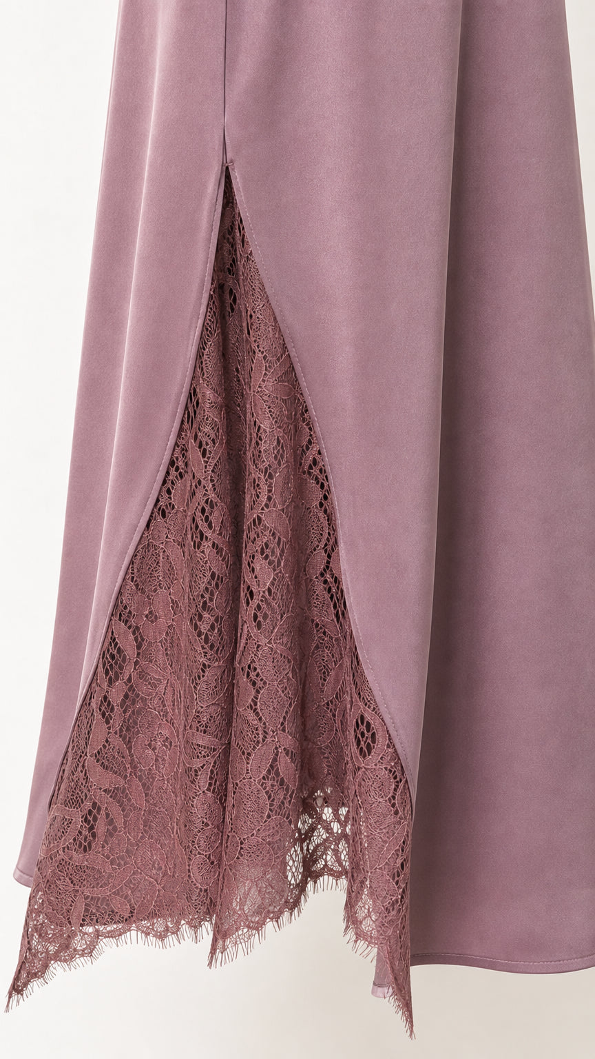 Close-up of the mauve lace-trimmed side hem detail