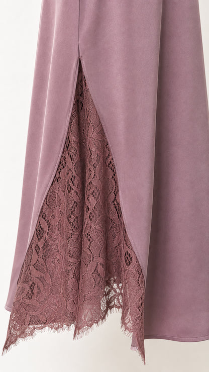 Close-up of the mauve lace-trimmed side hem detail