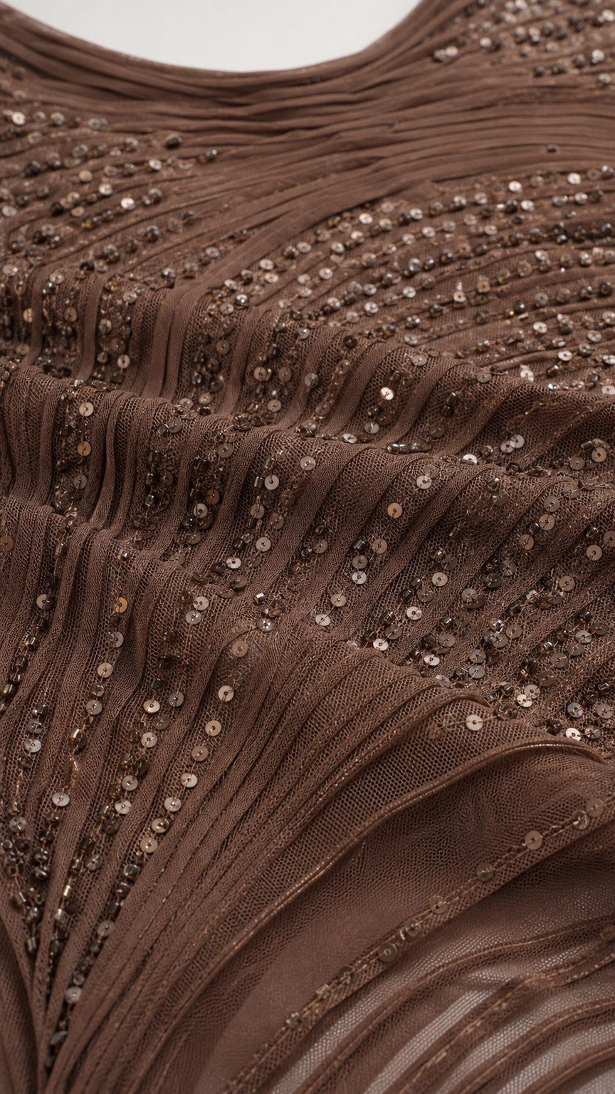Close-up of sequin and bead fabric texture