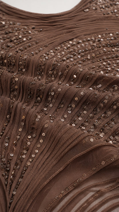 Close-up of sequin and bead fabric texture