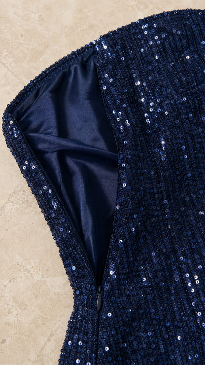 Close-up of side zipper and smooth lining of Navy sequin dress