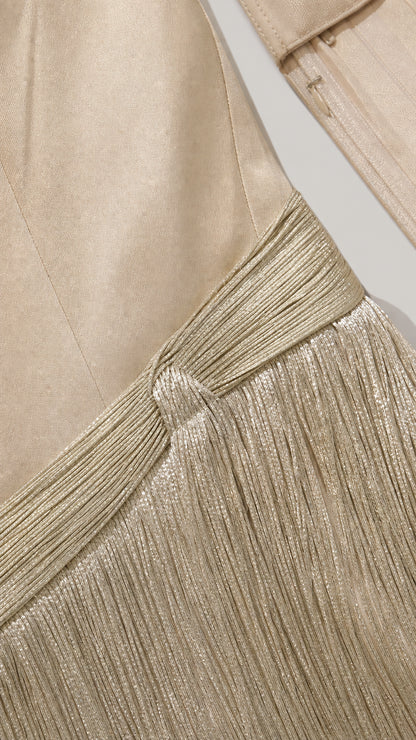 Close up of satin and fringe construction detail
