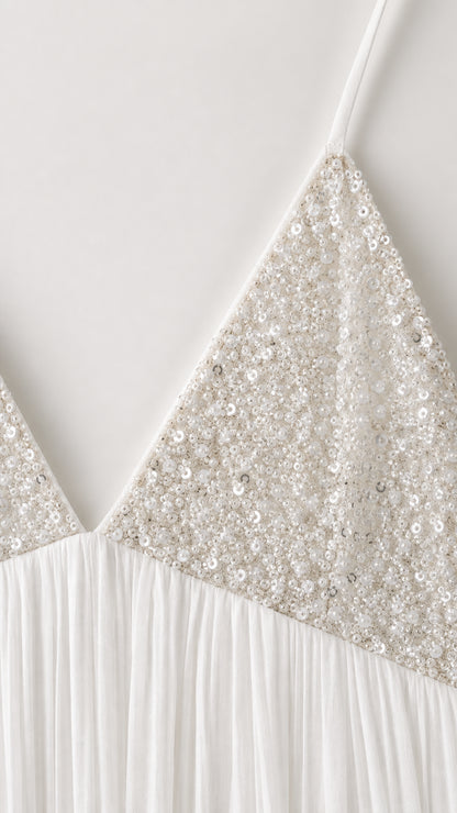 Close up detail of sequin embellished V-neck bodice