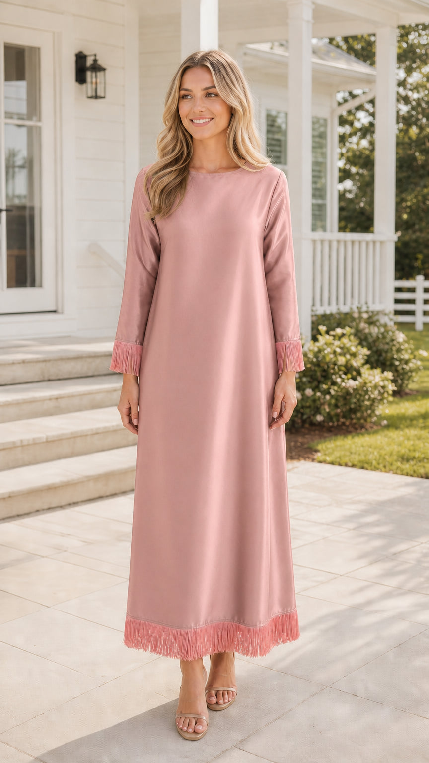Front view of pink maxi dress with fringe trim