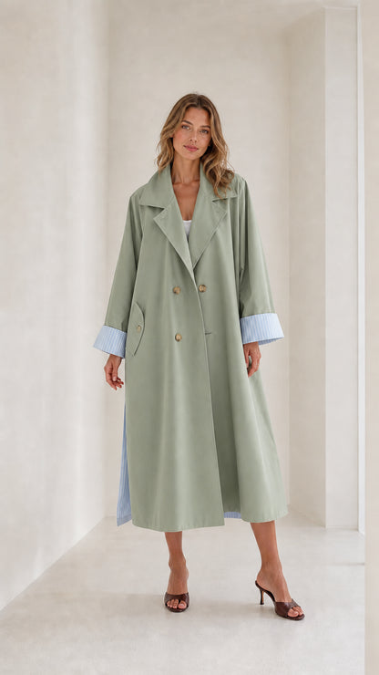 Front view of Sage Green trench coat with striped cuffs
