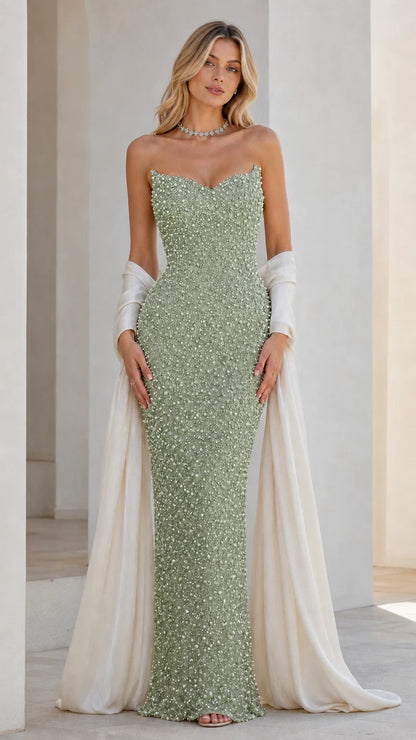 Front view of sage green beaded strapless evening dress with draped wrap