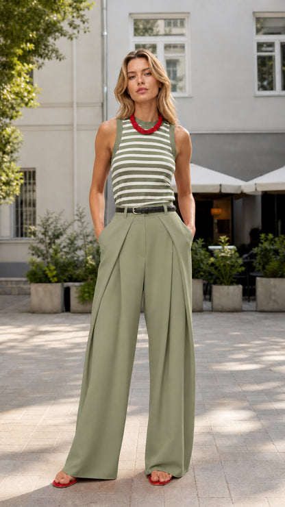Model wearing sage green wide-leg trousers