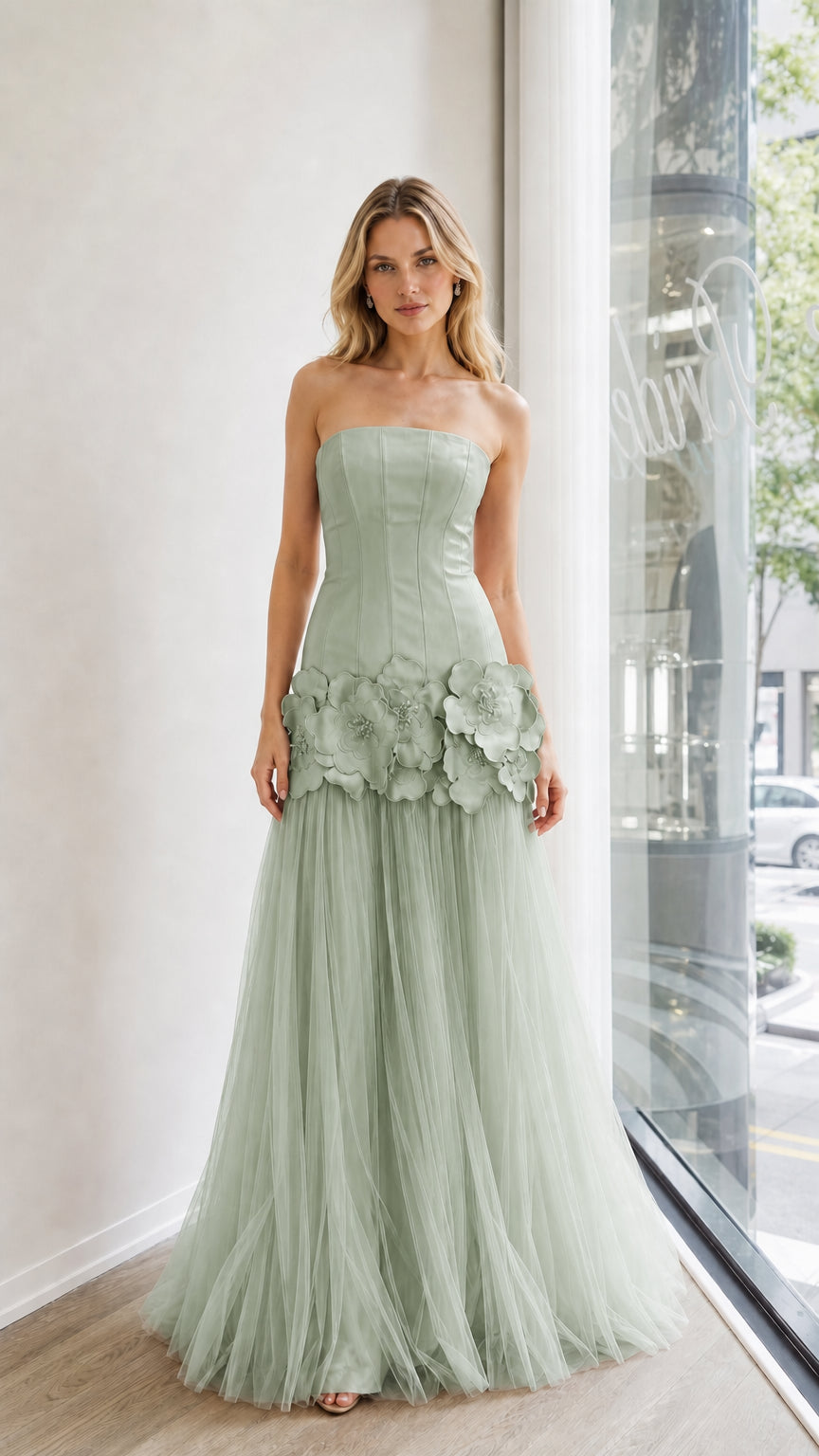 Front view of sage green strapless evening dress with floral appliques
