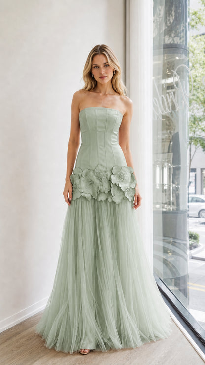 Front view of sage green strapless evening dress with floral appliques