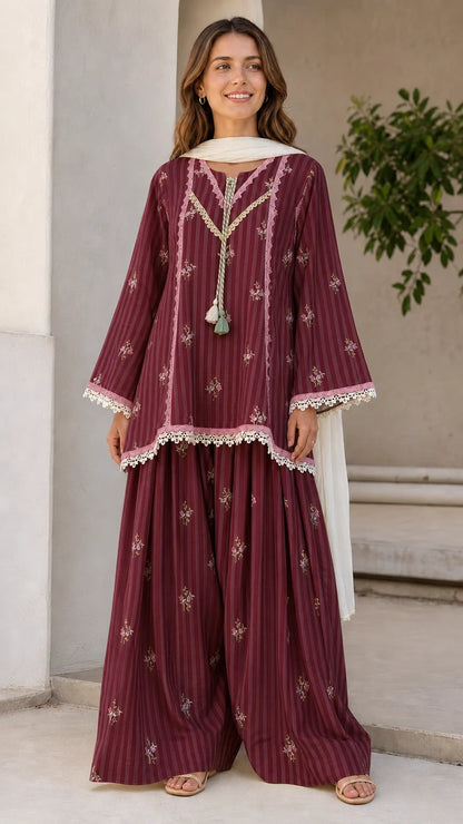 Front view of woman wearing maroon ethnic striped kurti and sharara set