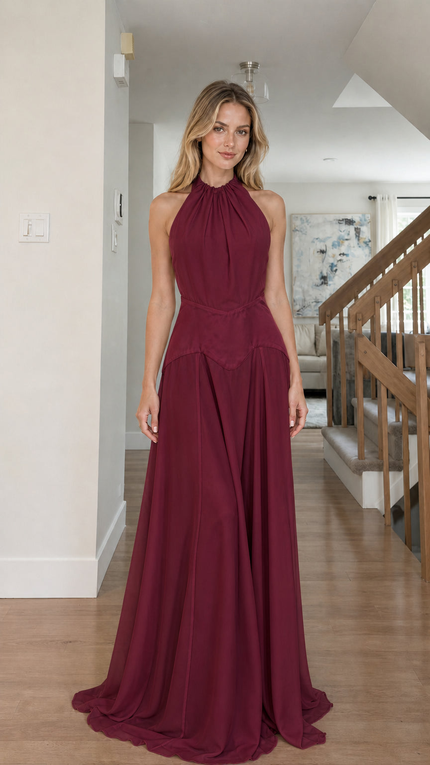 Model wearing burgundy color variant of the halter maxi dress