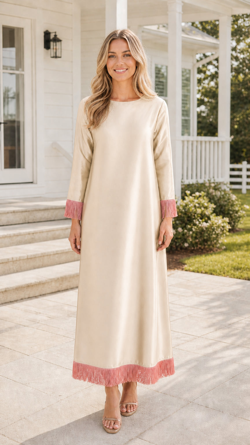 Front view of beige maxi dress with fringe trim
