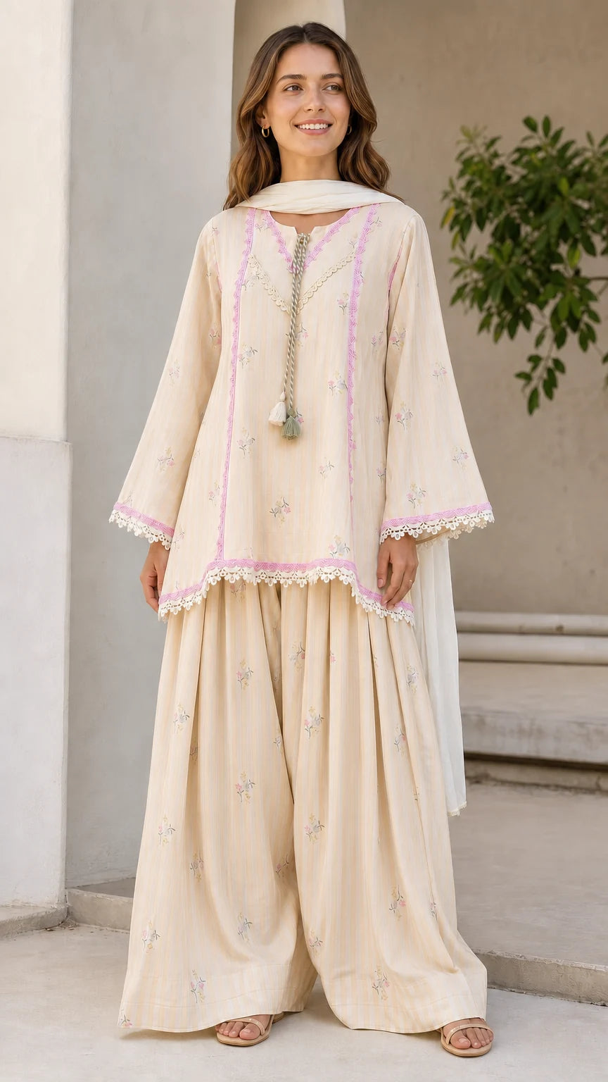 Front view of woman wearing beige ethnic striped kurti and sharara set